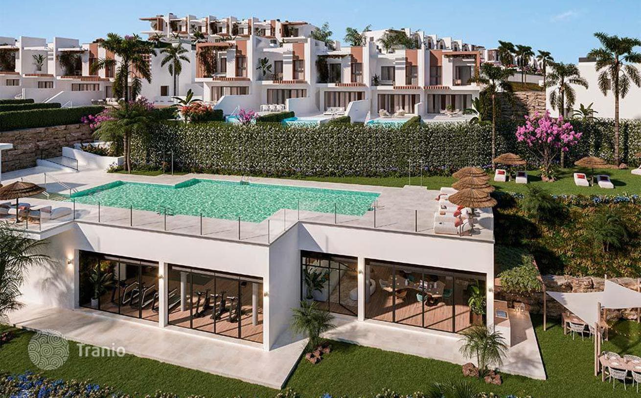 Beachfront Townhouses with Golf Course and Sea Views in Mijas