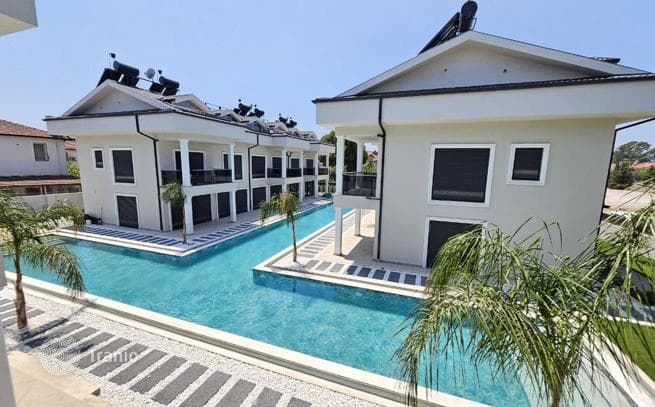 Modern Apartments with Shared Pool Near the Sea