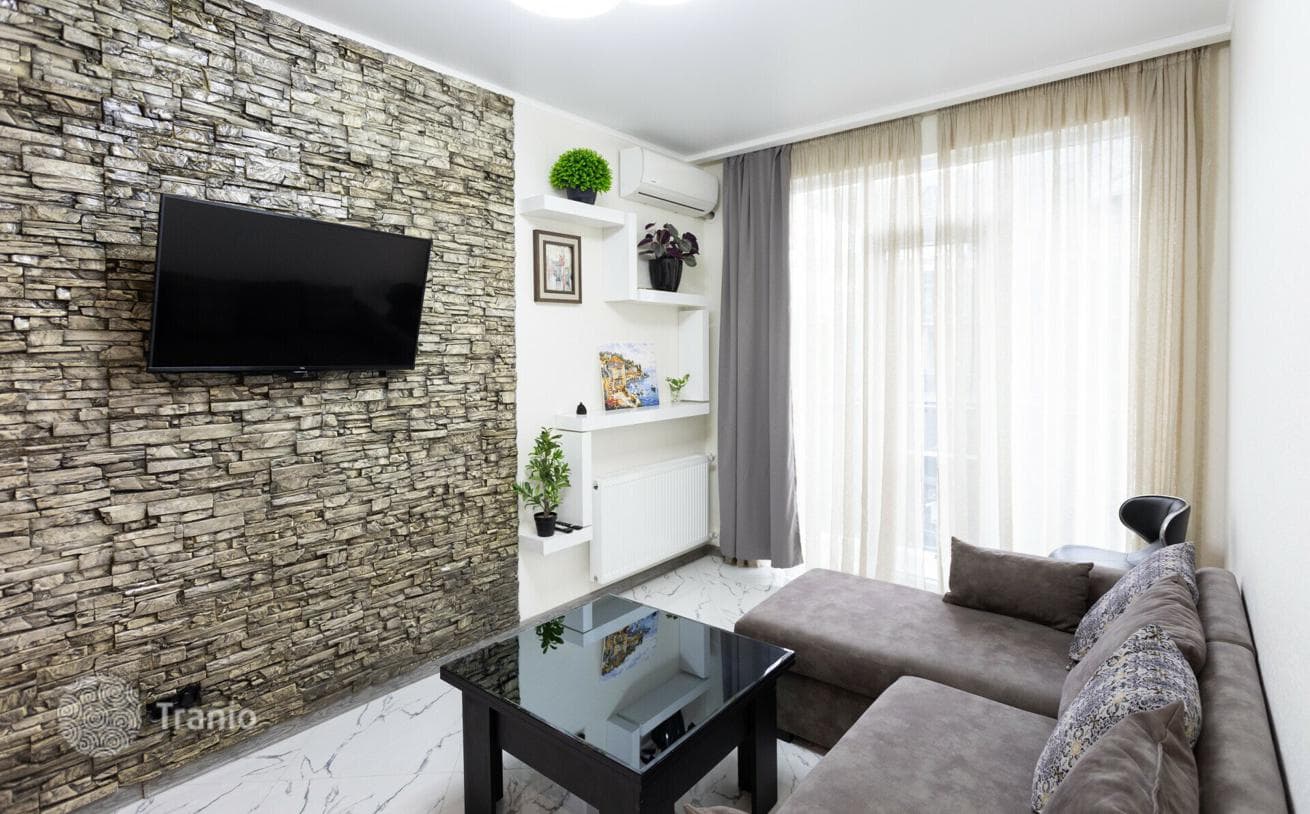 Beachfront Apartment with Sea, City and Mountain Views in Batumi